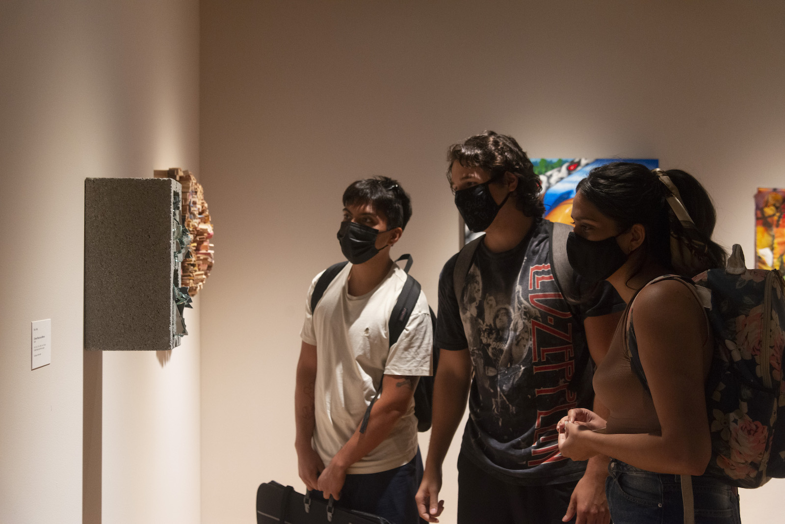 Students view art by Professor of Art Foon Sham