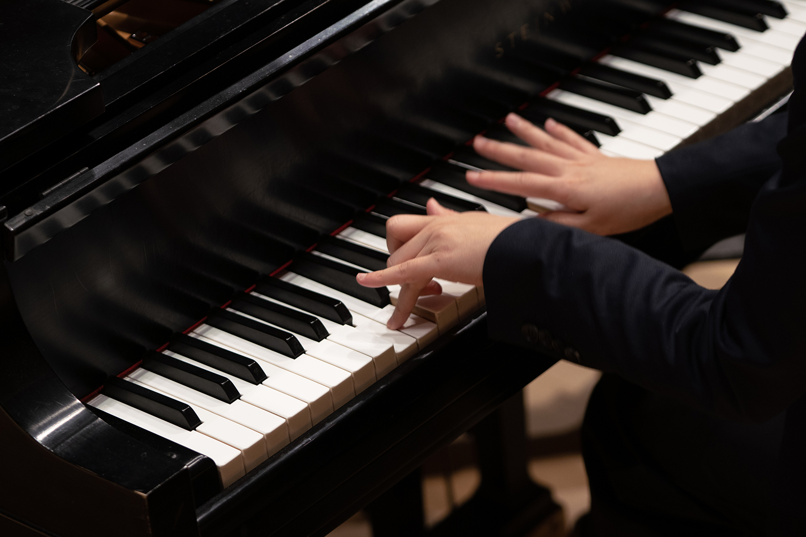 A person plays piano.