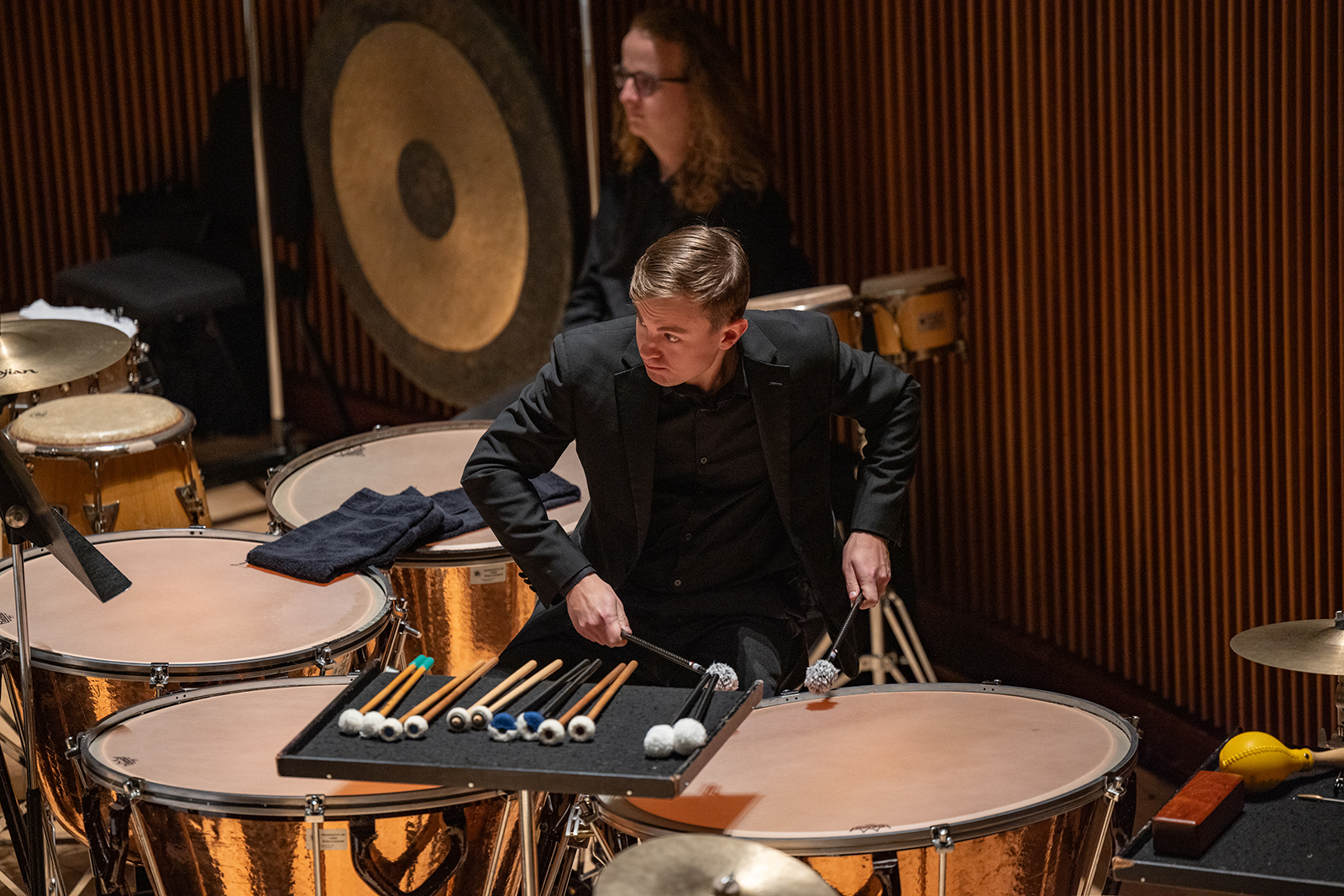 The UMD Percussion Ensemble performs on stage.