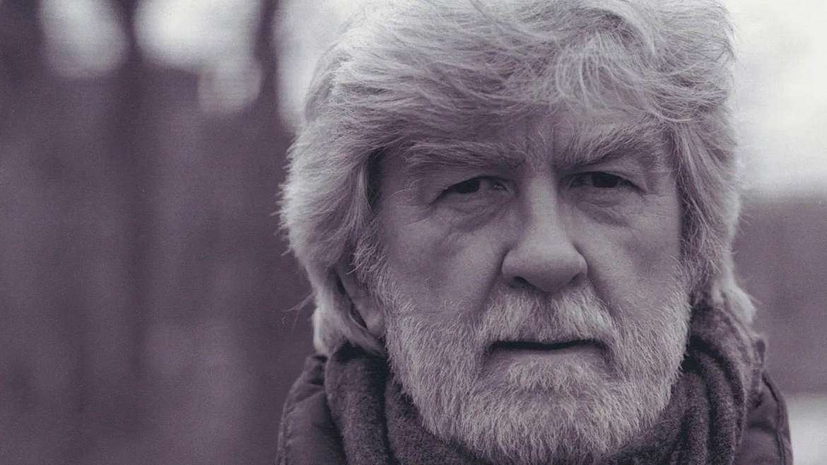 Black and white photo of Stanley Plumly