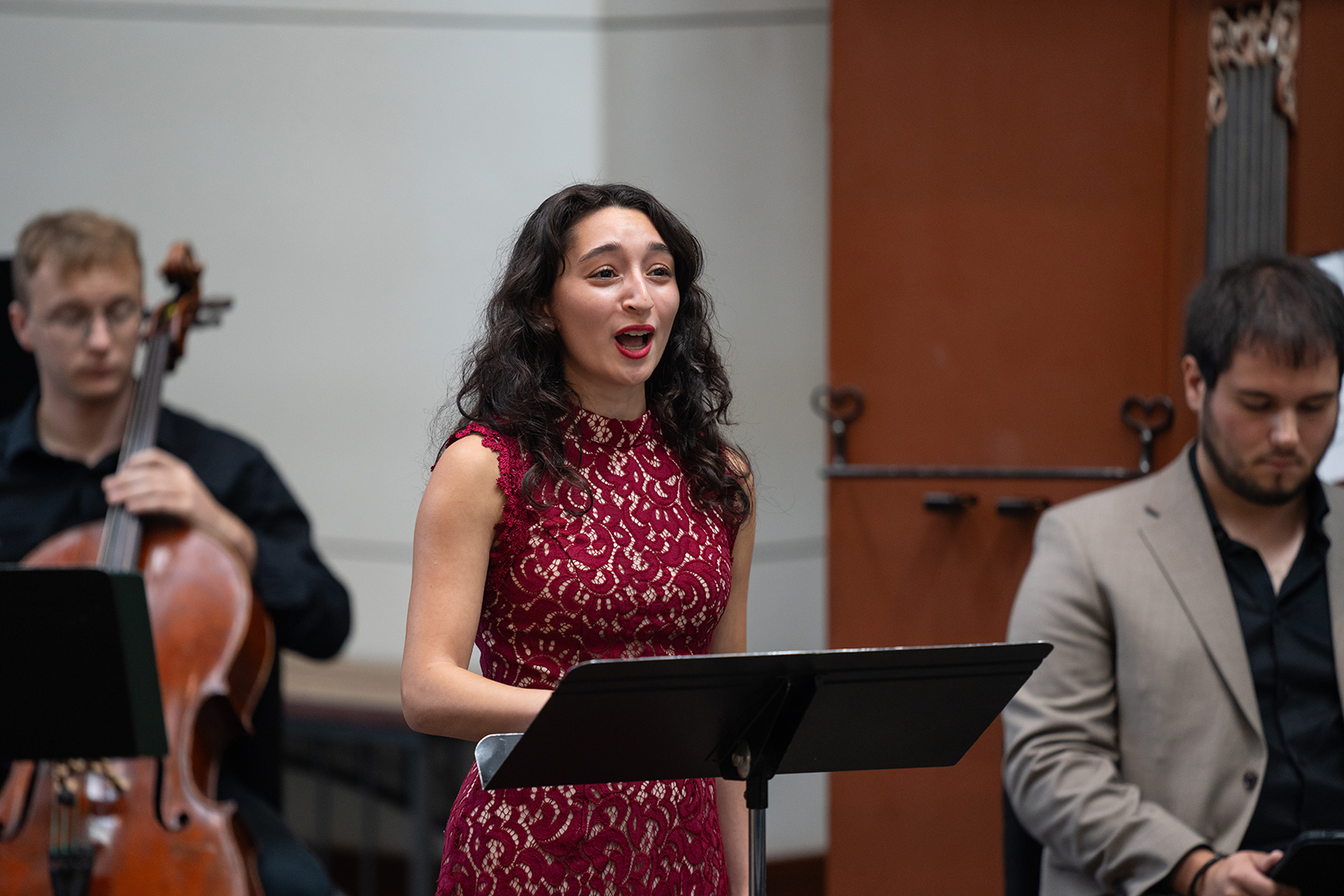 A choral students sings during the Bach Cantata Series.