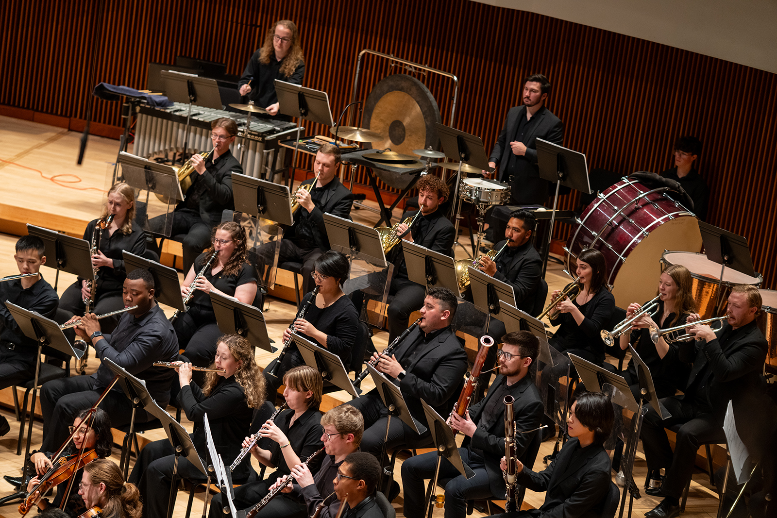 The UMD Symphony Orchestra performs on stage.