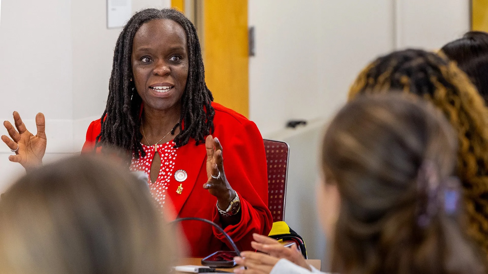 College of Arts and Humanities Dean Stephanie Shonekan leads a discussion on the pros and cons of charity songs like “We Are the World” last month. 