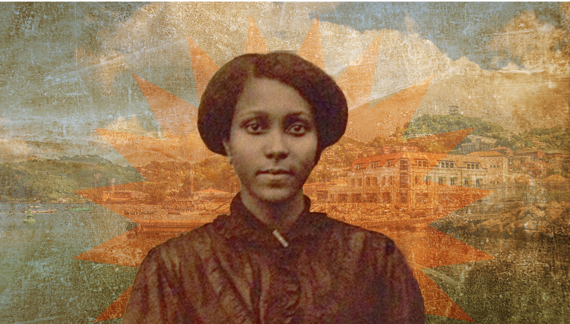 Louise little on blue and orange photo of Grenada