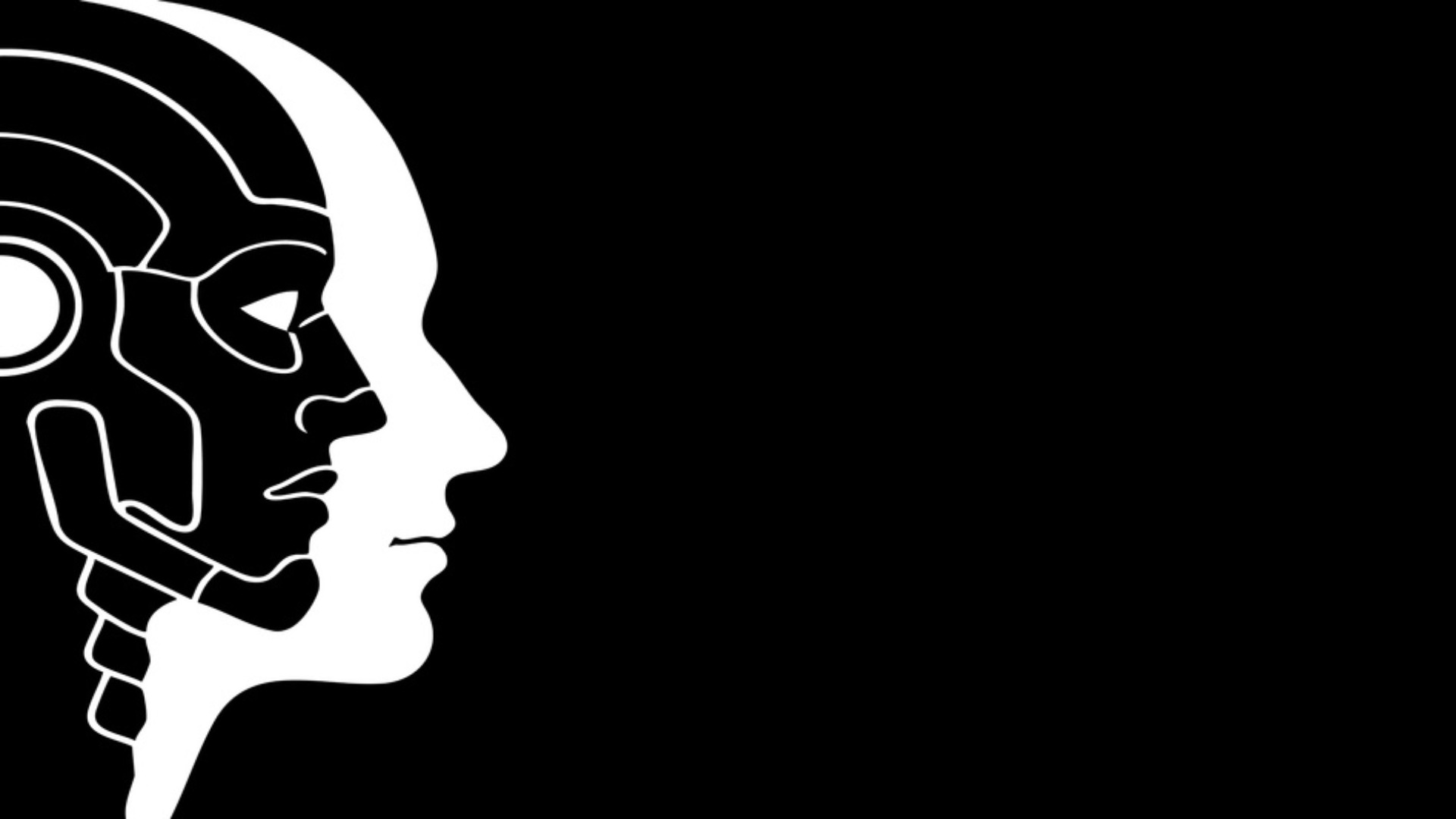 The silhouettes of a human and a robot next to one another. 